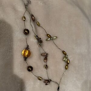 Elegant Gold and Brown Beaded floating bracelet